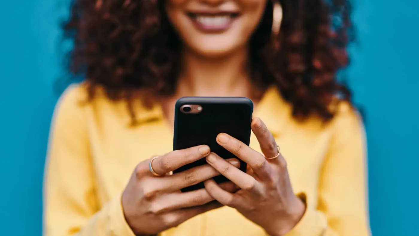 Woman texting on her phone