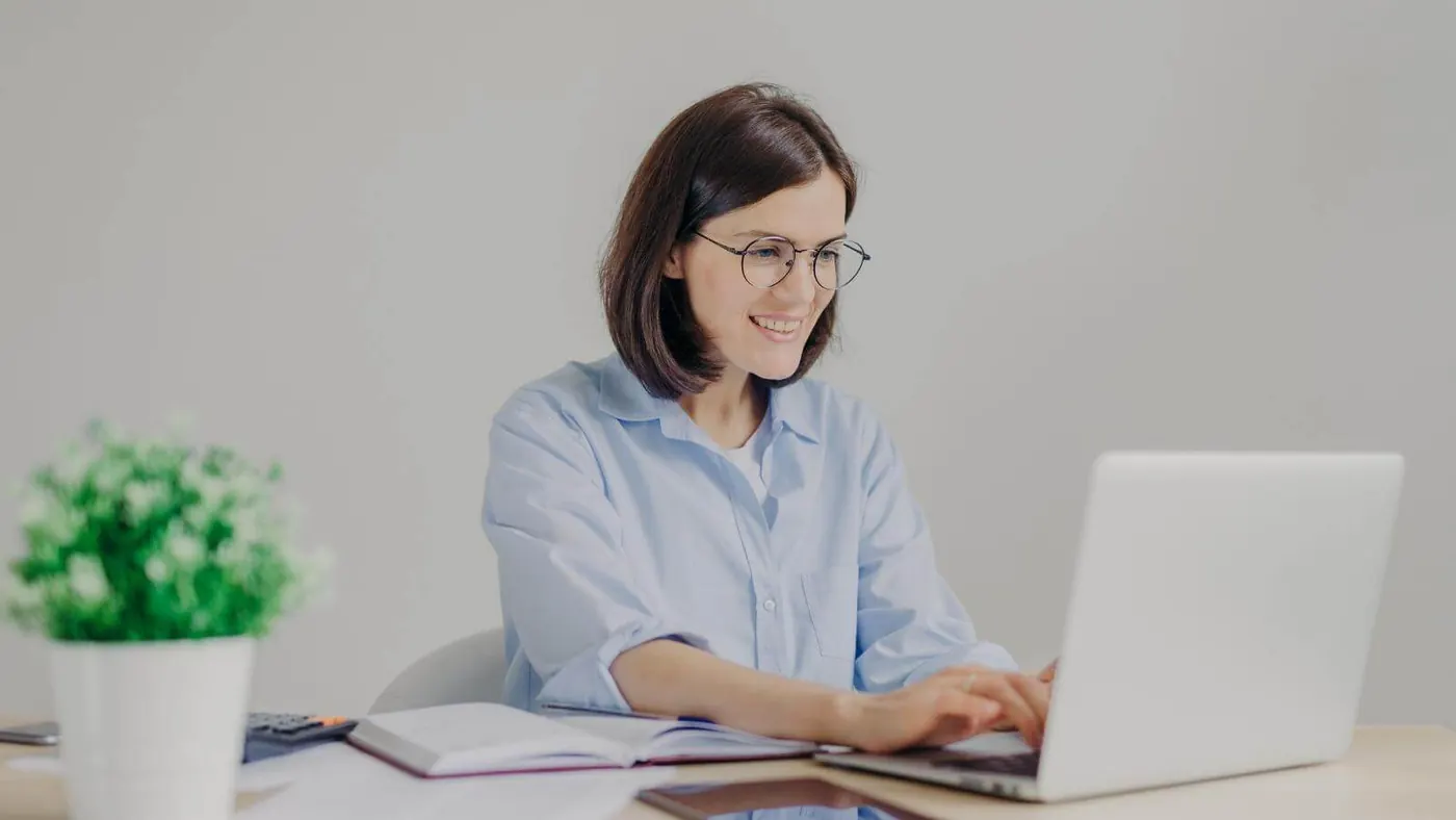 Woman working on her lapop