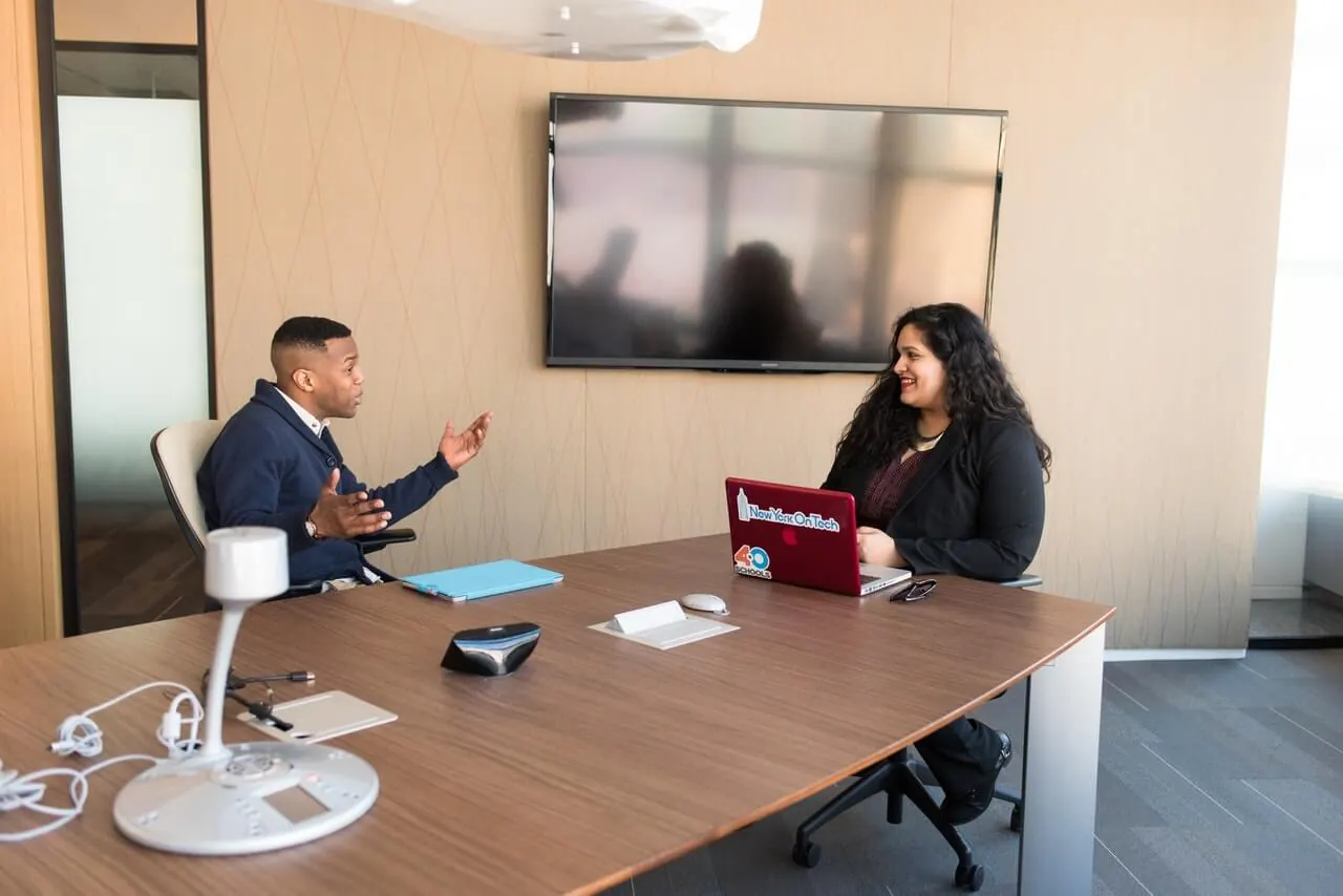 A marketer interviews a customer to learn about their desired outcome