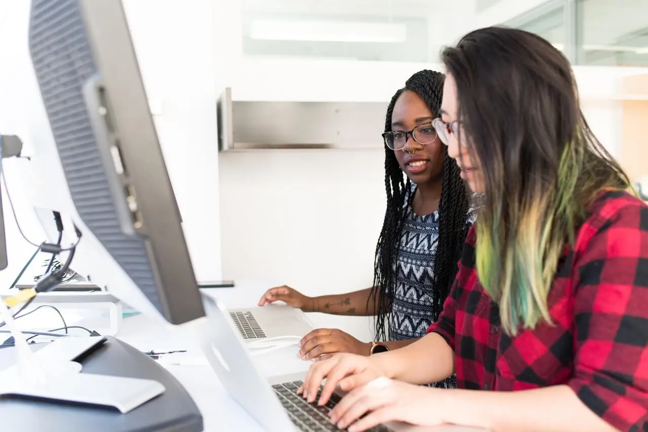 Two marketers monitor online conversations in the communities where their audience spends time